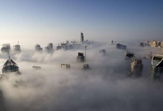 Головокружительные снимки городов, утопающих в облаках